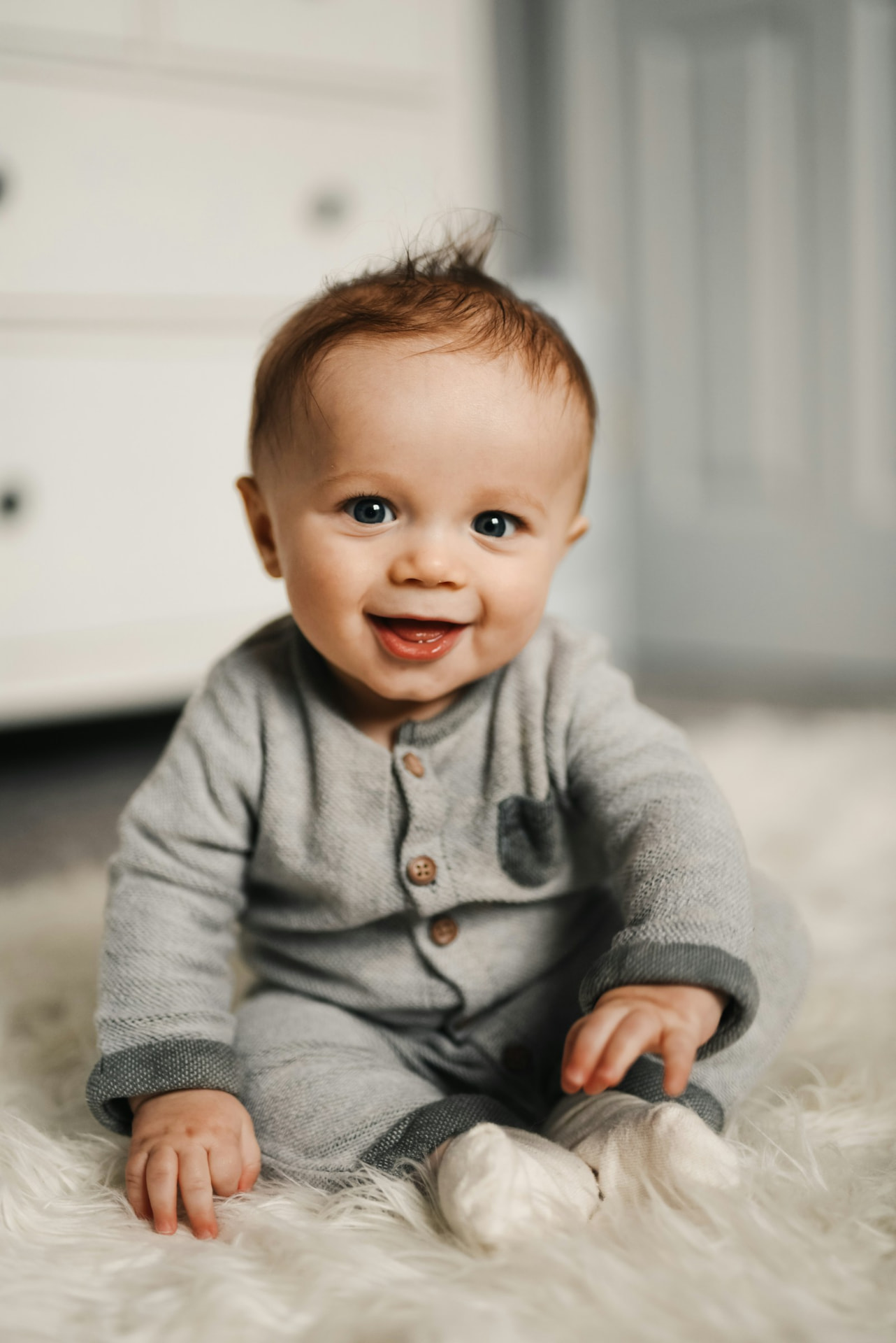 Smiling baby sitting up
